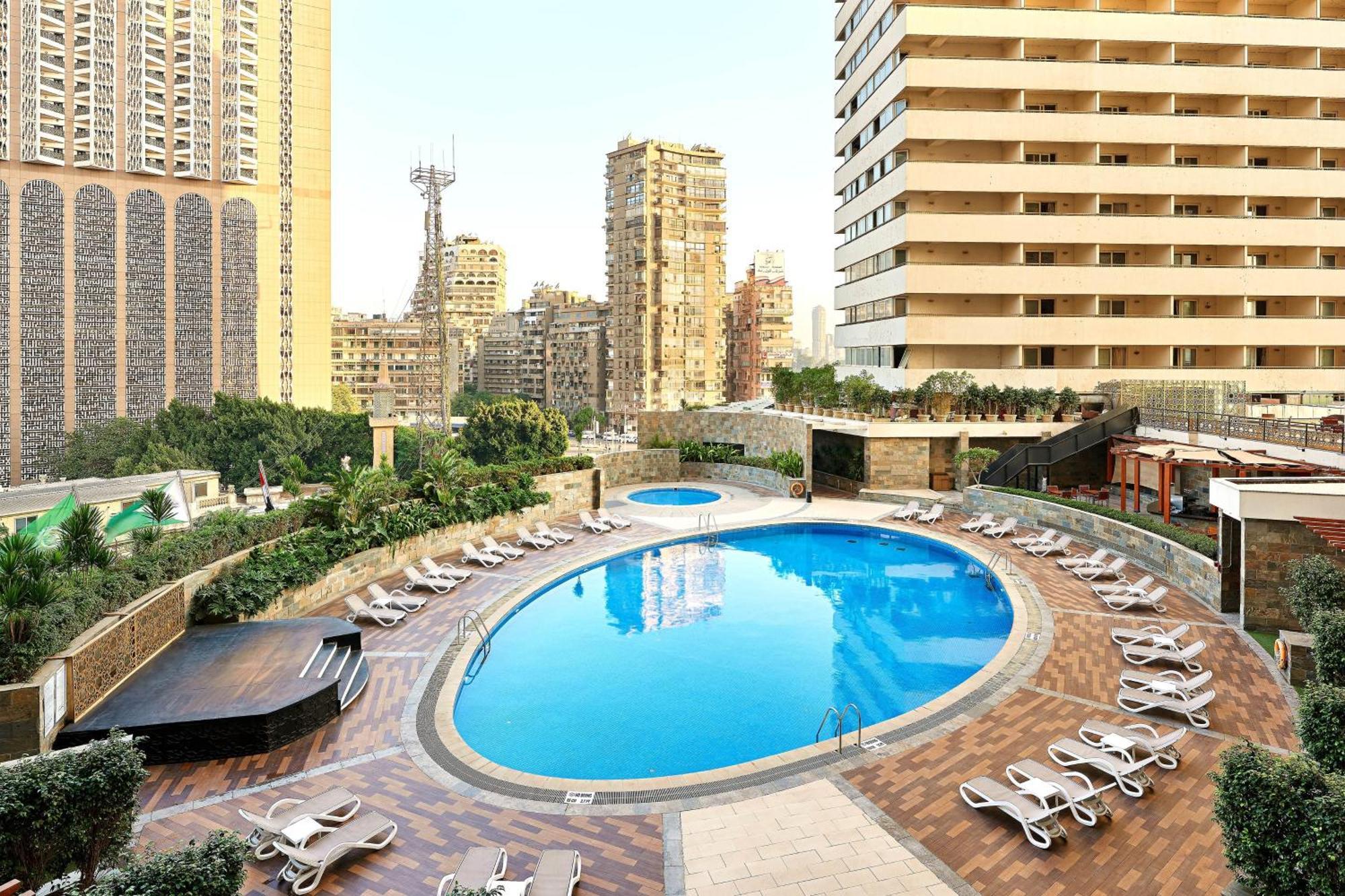 Sheraton Cairo Hotel & Casino Giza Exterior photo The pool at the Grand Hotel