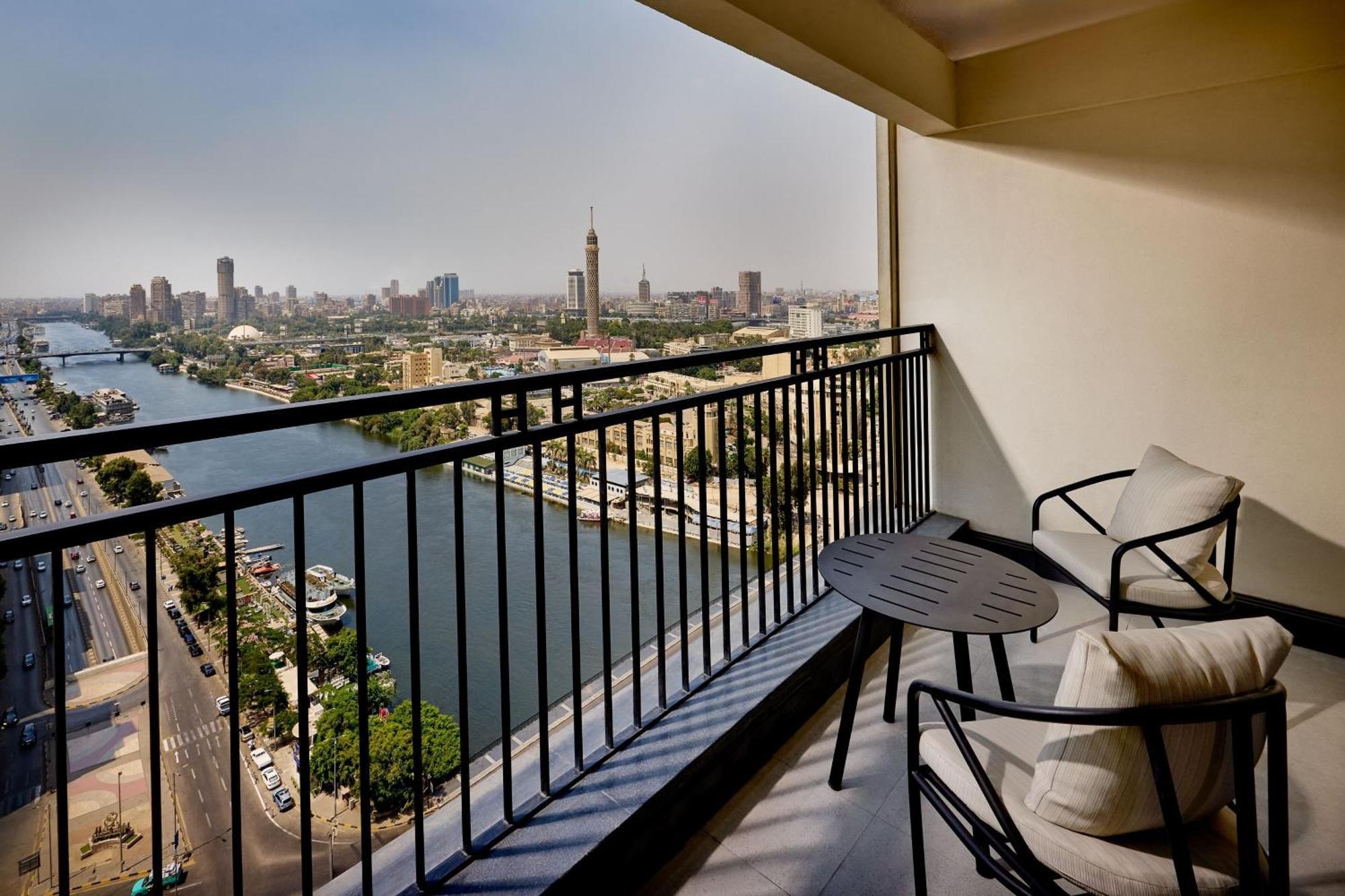 Sheraton Cairo Hotel & Casino Giza Exterior photo View of the Nile from the balcony of a suite at the Four Seasons Hotel, Cairo